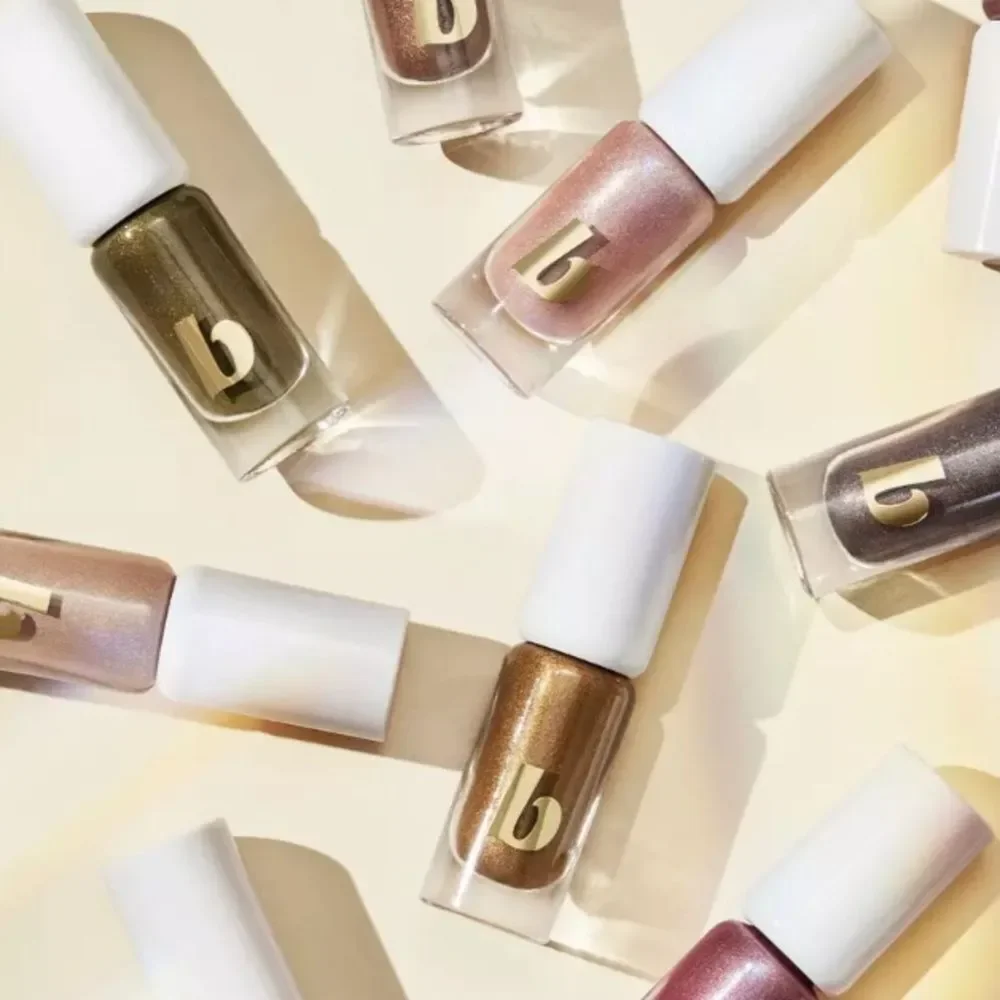 Beautycounter Lid Glow Cream Shadow in Ember, a  shimmering deep bronze BNIB